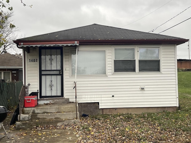 1402 Berkeley Ave, Chicago Heights, IL 60411 - view of front of house featuring a shingled roof