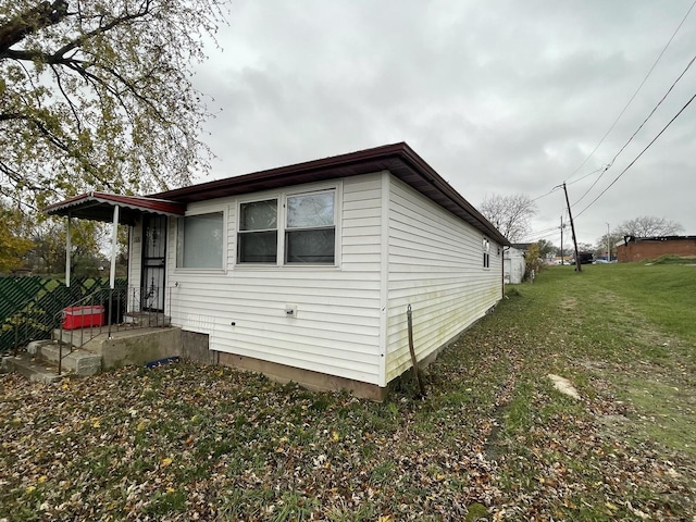 1402 Berkeley Ave, Chicago Heights, IL 60411 - view of side of home featuring a yard