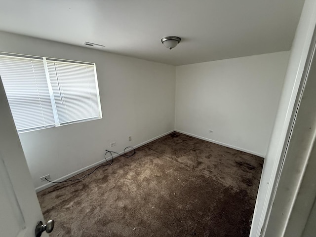 1402 Berkeley Ave, Chicago Heights, IL 60411 - carpeted empty room with baseboards