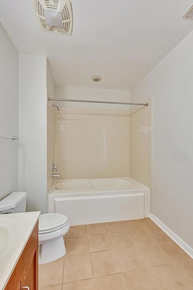 full bathroom with vanity, toilet, tile patterned floors, and tiled shower / bath combo