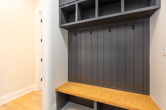 mudroom with light hardwood / wood-style flooring