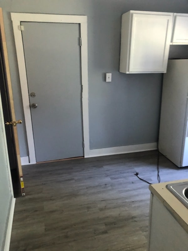 interior space featuring dark wood-type flooring