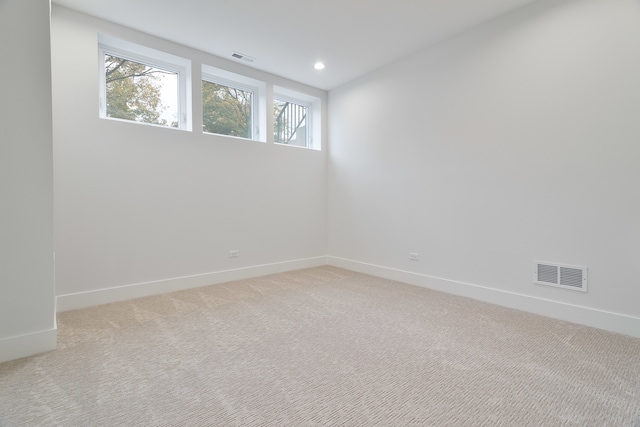 unfurnished room featuring carpet floors