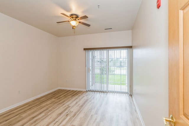 spare room with light hardwood / wood-style floors and ceiling fan