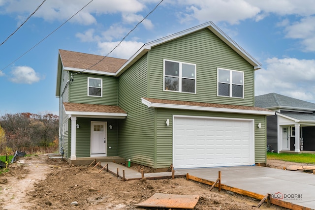 view of front of home with a garage