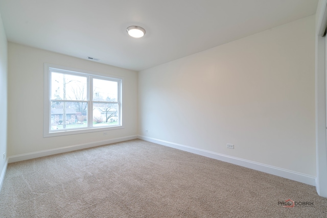 view of carpeted spare room