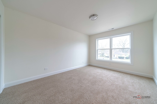 view of carpeted spare room