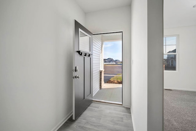 doorway featuring light hardwood / wood-style flooring