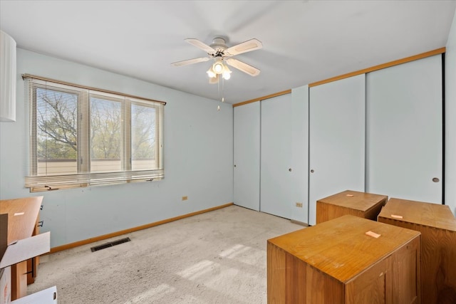 1730 W Galena Blvd Unit 402E, Aurora, IL 60506 - interior space featuring ceiling fan and light carpet