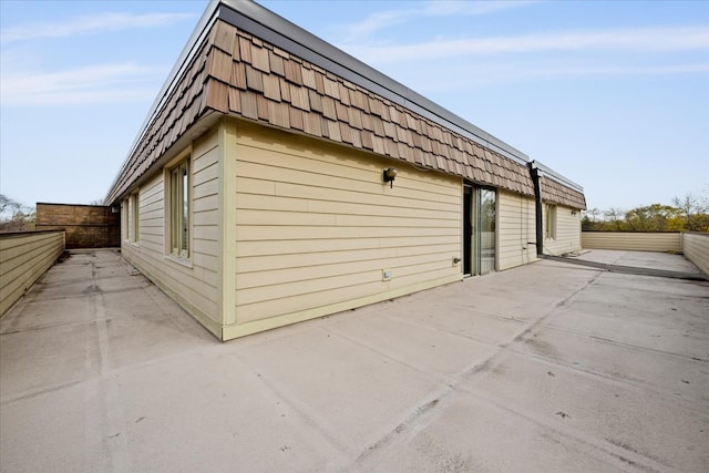 1730 W Galena Blvd Unit 402E, Aurora, IL 60506 - view of side of property with a patio area