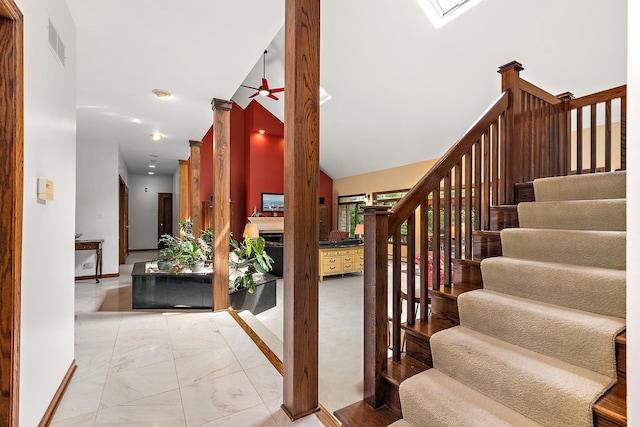 staircase with ceiling fan