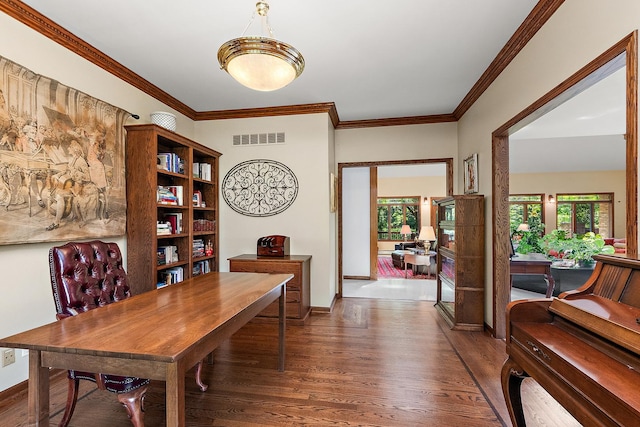 office area featuring dark wood-type flooring and ornamental molding