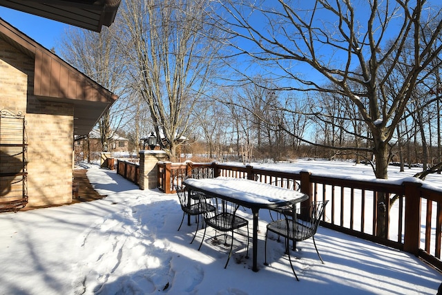 view of snow covered deck