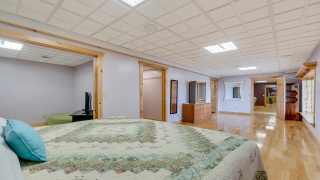 bedroom with wood-type flooring