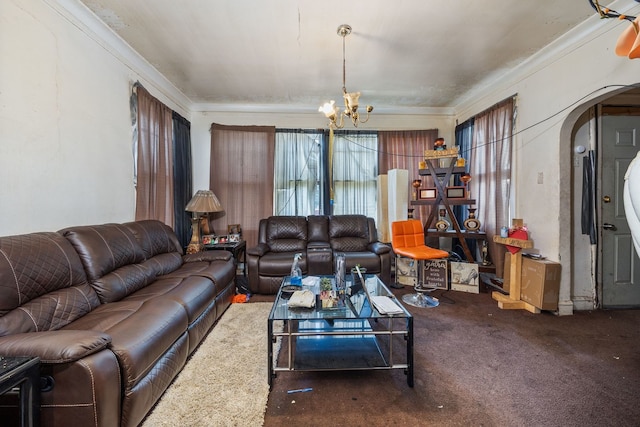 carpeted living room with crown molding and a chandelier