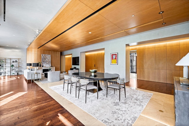 dining space with wooden ceiling