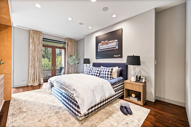 bedroom with french doors, access to outside, and dark hardwood / wood-style floors