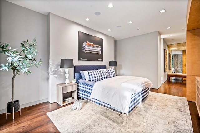 bedroom featuring dark hardwood / wood-style floors