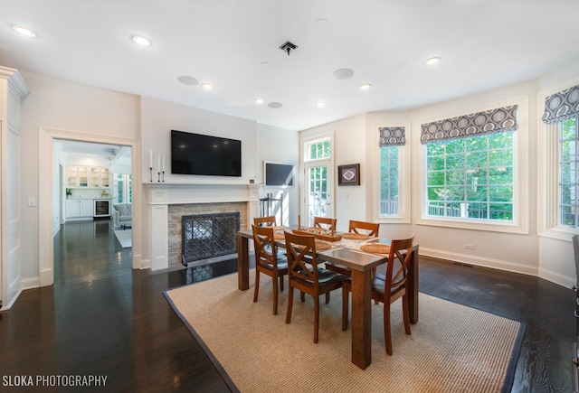 dining room featuring dark hardwood / wood-style floors