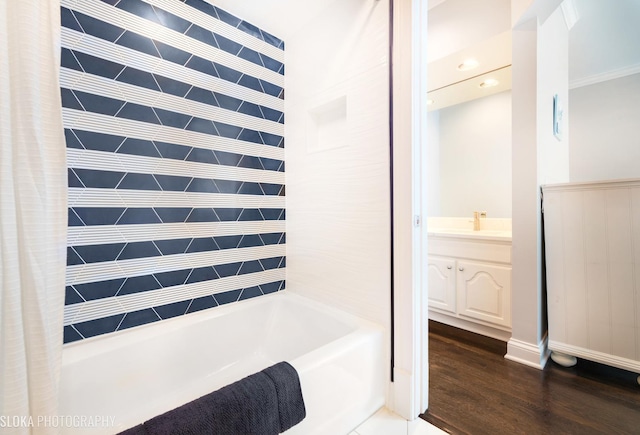 bathroom with vanity, shower / tub combo, and hardwood / wood-style flooring