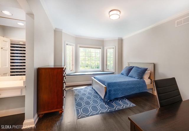 bedroom featuring dark hardwood / wood-style flooring and ornamental molding