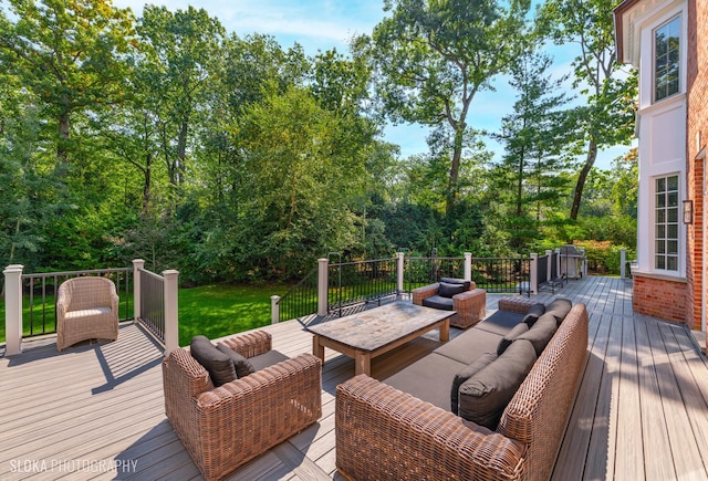 deck with an outdoor hangout area