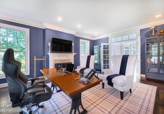 office area with hardwood / wood-style floors, french doors, and ornamental molding