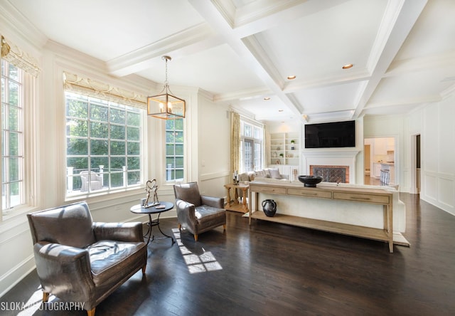 bedroom with ornamental molding, coffered ceiling, dark wood-type flooring, beam ceiling, and an inviting chandelier