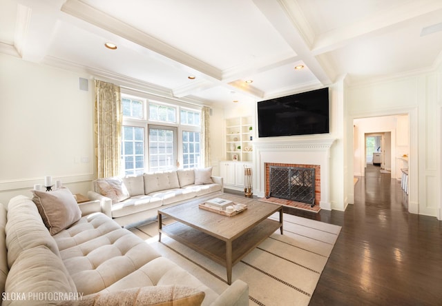 living room featuring dark wood-type flooring, coffered ceiling, crown molding, built in features, and beam ceiling