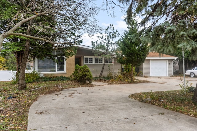 ranch-style home with a garage