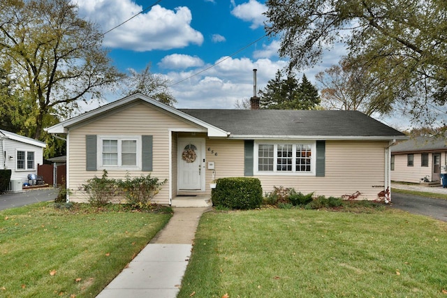 view of front of house featuring a front lawn