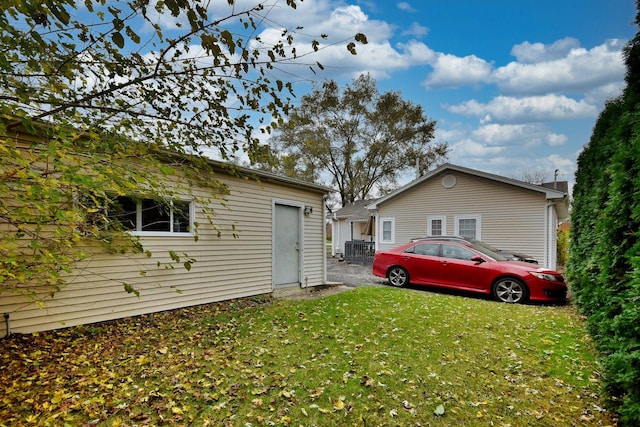 exterior space with a yard