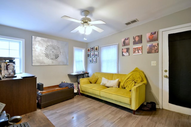 interior space with ceiling fan, a healthy amount of sunlight, and light hardwood / wood-style floors