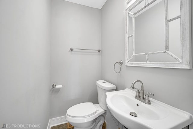 bathroom featuring sink and toilet