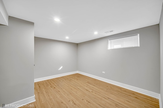 spare room featuring light hardwood / wood-style flooring