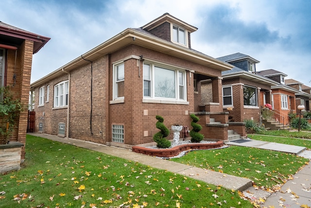 view of front of home with a front yard