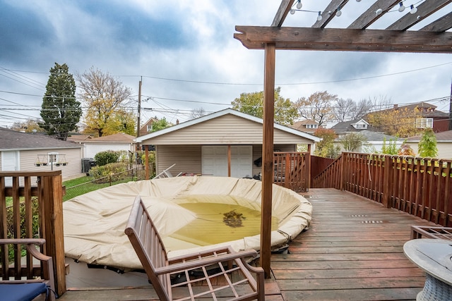 wooden deck featuring a pergola