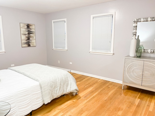 bedroom featuring hardwood / wood-style flooring