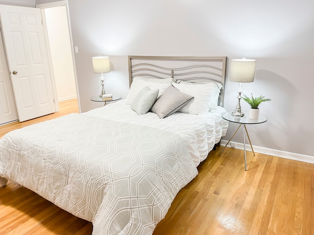 bedroom featuring hardwood / wood-style flooring