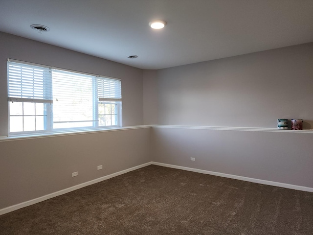 view of carpeted spare room