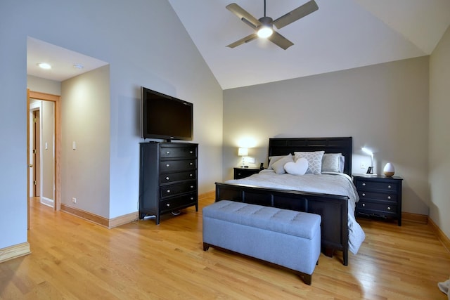 bedroom with high vaulted ceiling, light hardwood / wood-style flooring, and ceiling fan