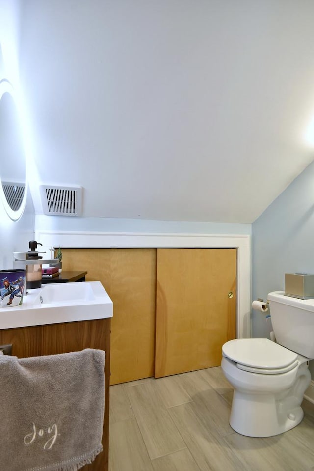 bathroom with toilet and sink