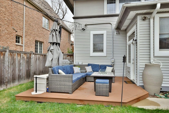 wooden terrace featuring an outdoor hangout area