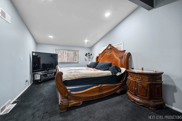 bedroom with dark carpet