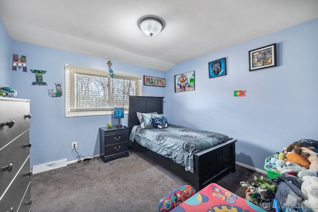 carpeted bedroom featuring lofted ceiling