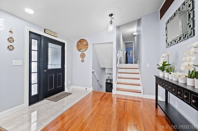 entrance foyer featuring hardwood / wood-style floors