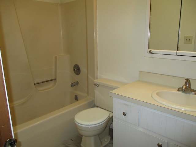 full bathroom featuring shower / bathing tub combination, vanity, and toilet