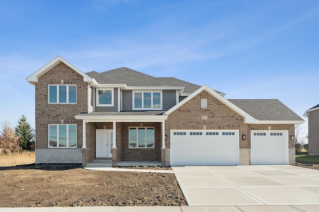 8035 Stanley Trl, Frankfort, IL 60423 - view of front of home with an attached garage, concrete driveway, roof with shingles, and brick siding