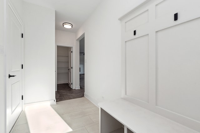 mudroom featuring light tile patterned flooring