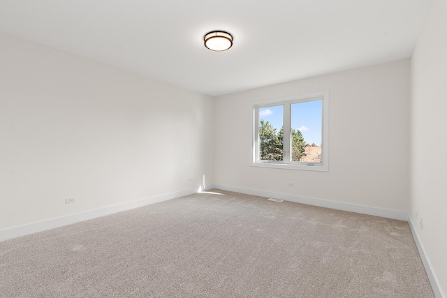 8035 Stanley Trl, Frankfort, IL 60423 - empty room with light carpet and baseboards